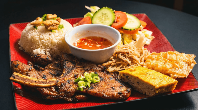 Grilled Pork Chop, Shredded Pork Skin, Steamed Egg & Fried Tofu Shrimp Paste with Broken Rice.